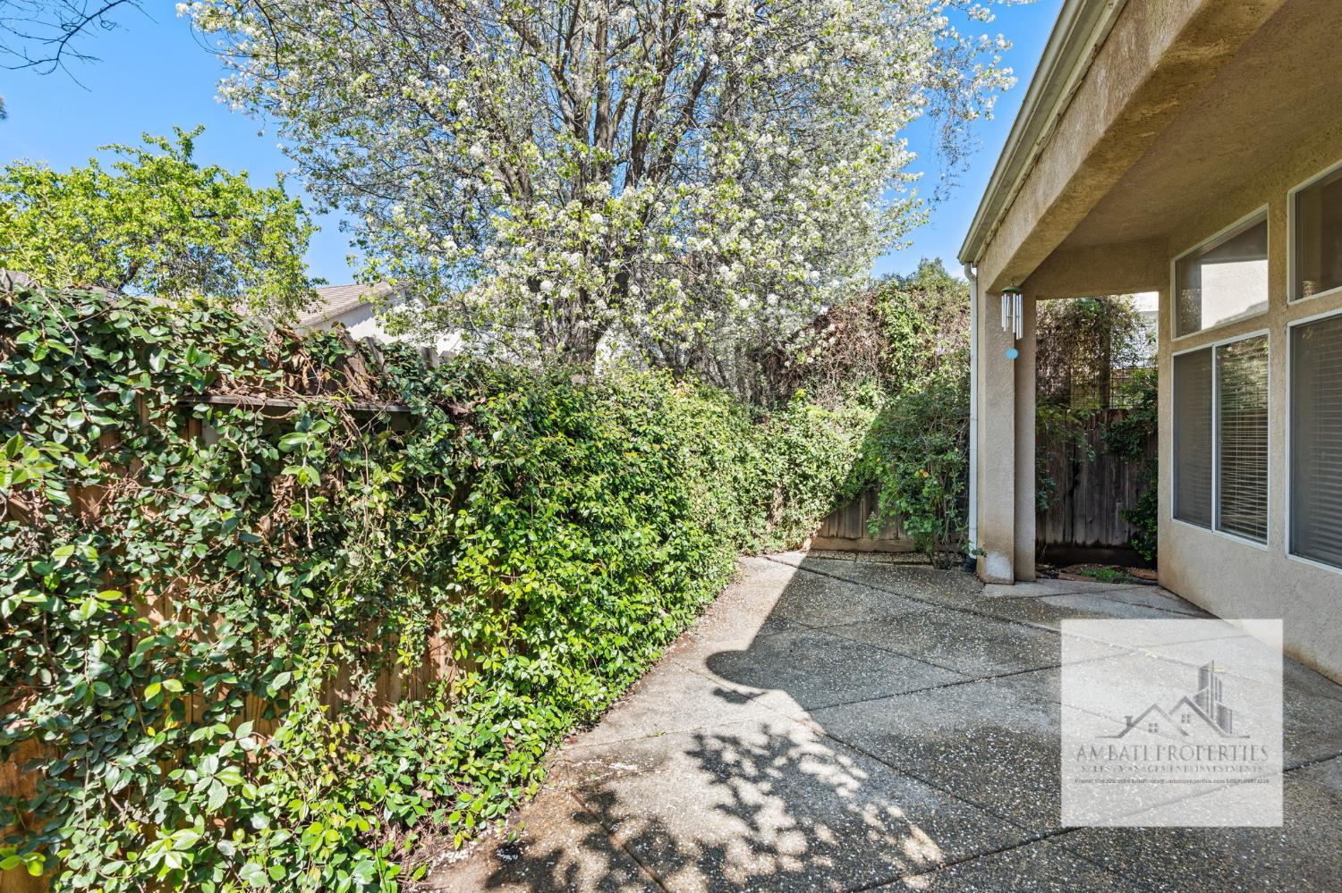 7577 North Trellis Circle Fresno, CA 93720 - Photo 9 of 11 a view of a pathway both side of the house