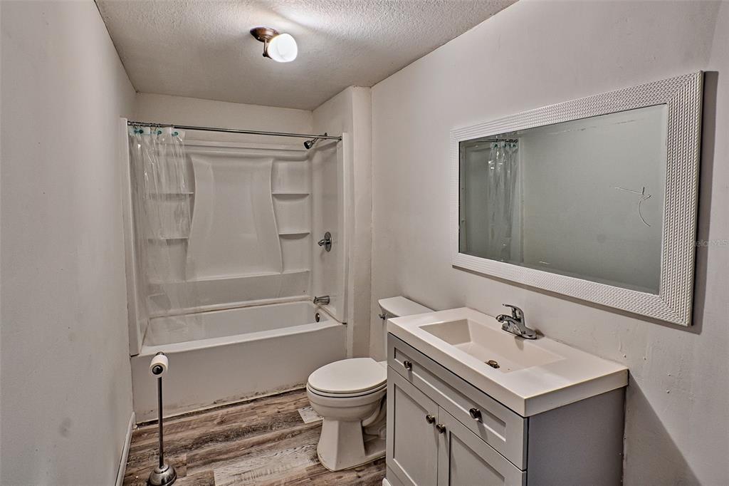 300 South Us Highway Bell, FL 32619 - Photo 11 of 47 a bathroom with a sink toilet and shower