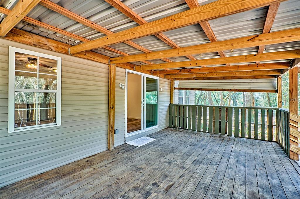 300 South Us Highway Bell, FL 32619 - Photo 18 of 47 a view of backyard with porch