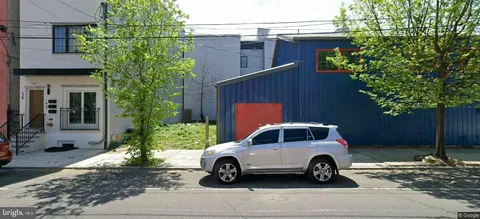a car parked in front of a house