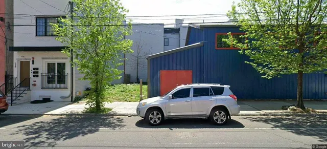 a car parked in front of a house