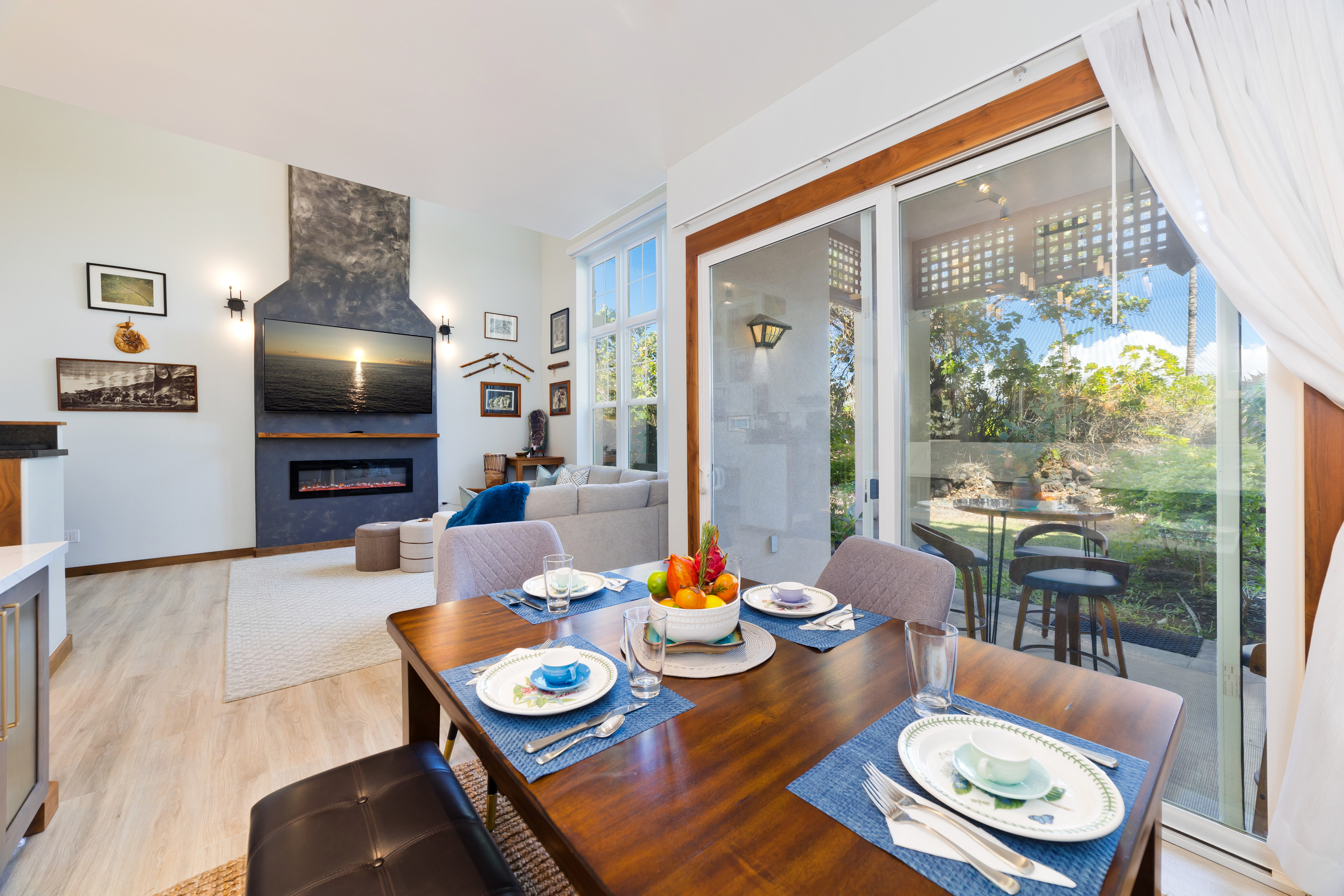 69-555 Waikoloa Beach Drive, Unit 2303 Waikoloa, HI 96738 - Photo 15 of 30 a living room with furniture and a flat screen tv
