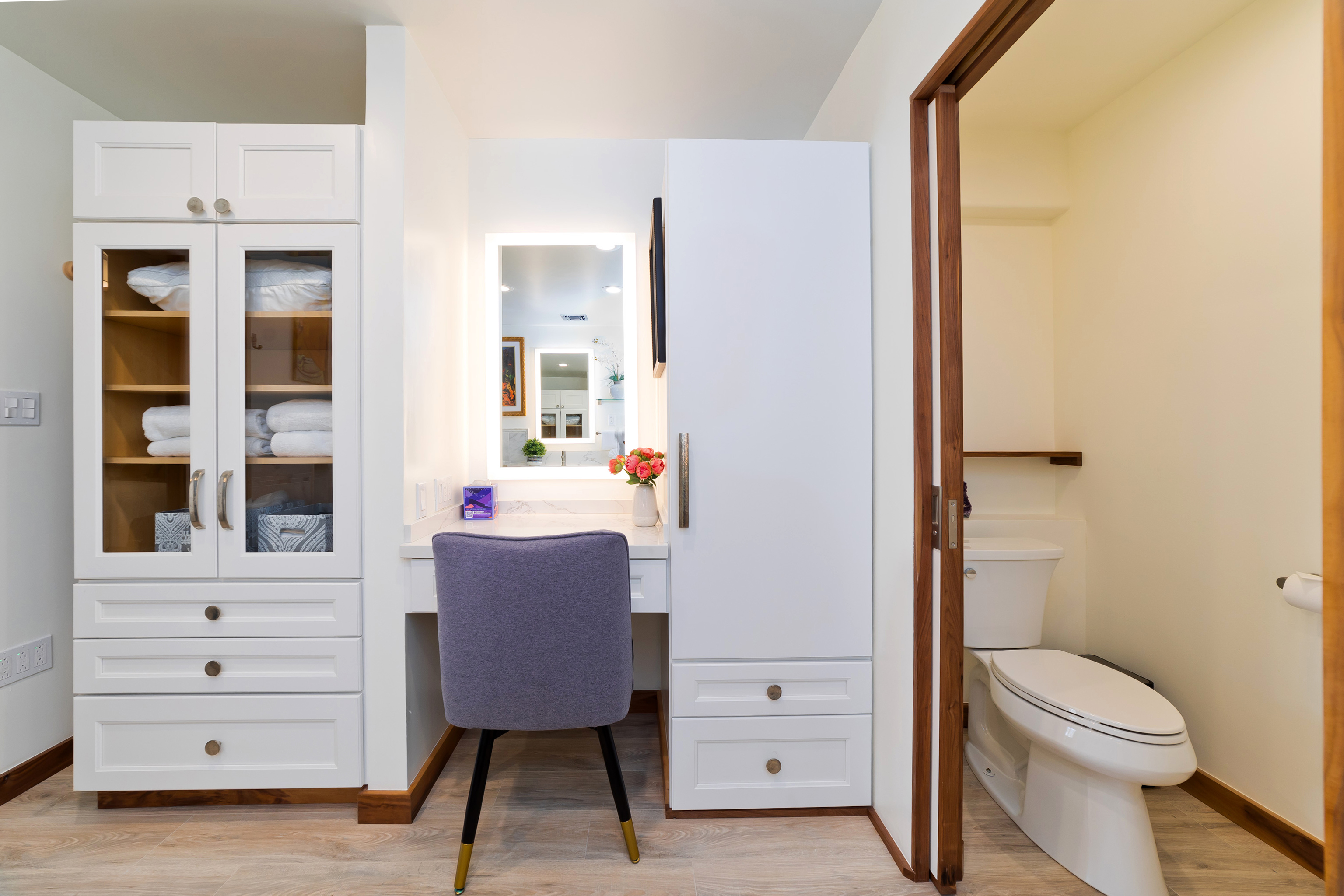 69-555 Waikoloa Beach Drive, Unit 2303 Waikoloa, HI 96738 - Photo 21 of 30 a bathroom with a toilet a sink and a mirror