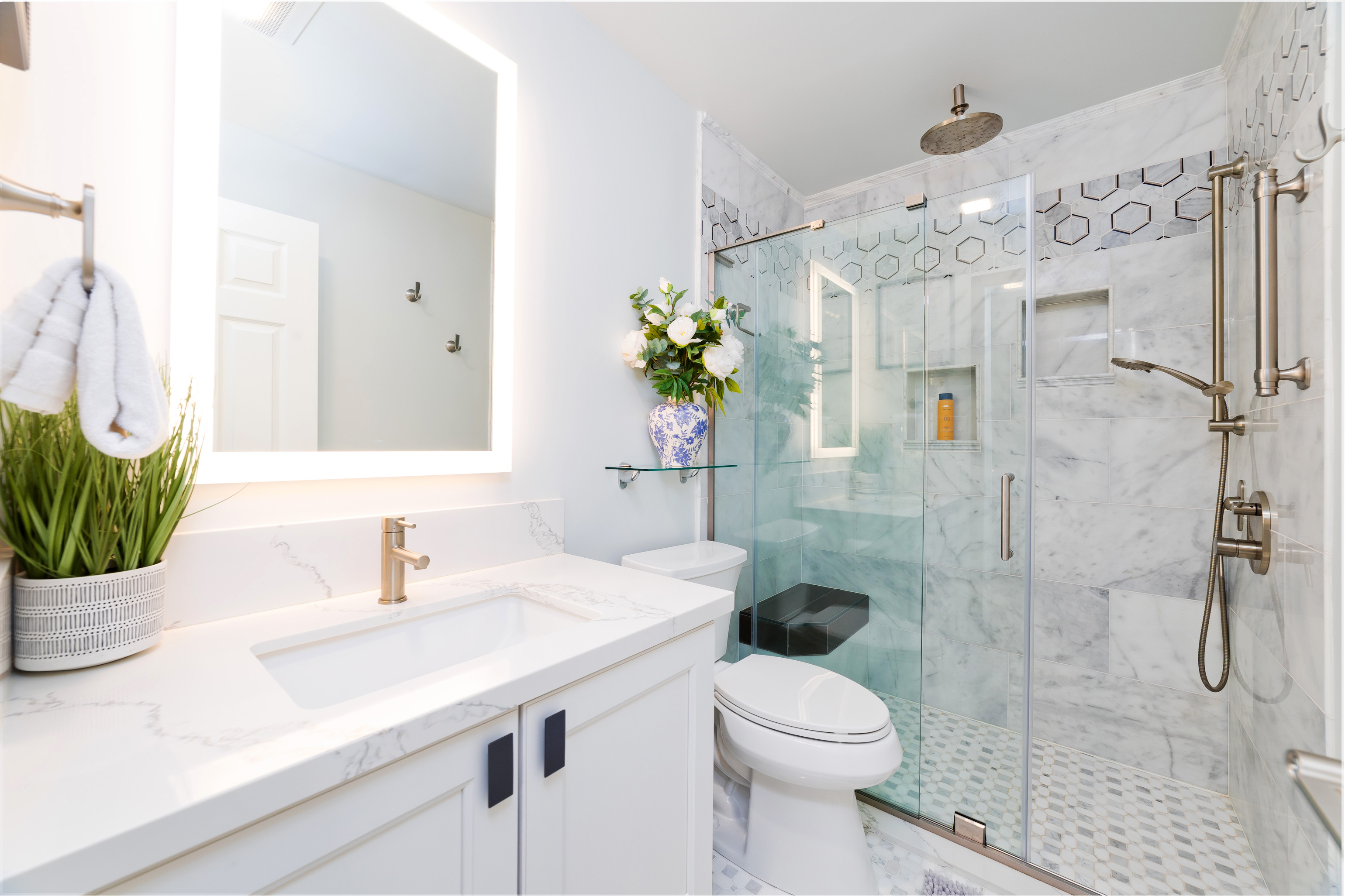 69-555 Waikoloa Beach Drive, Unit 2303 Waikoloa, HI 96738 - Photo 26 of 30 a bathroom with a sink toilet and shower