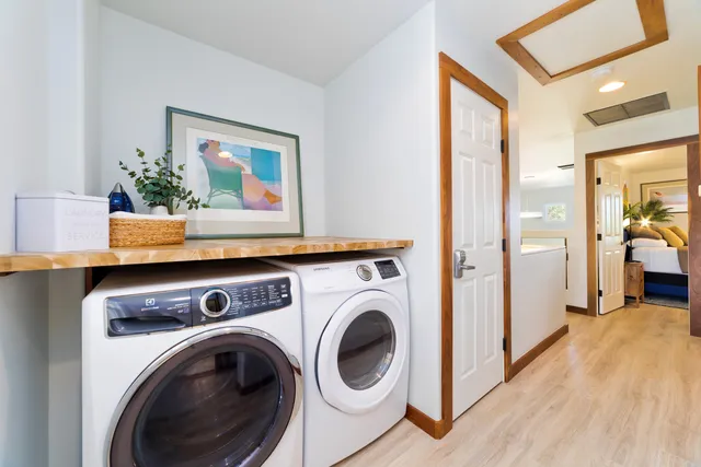 a view of hallway with washer and dryer