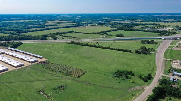 an aerial view of a golf course with a park