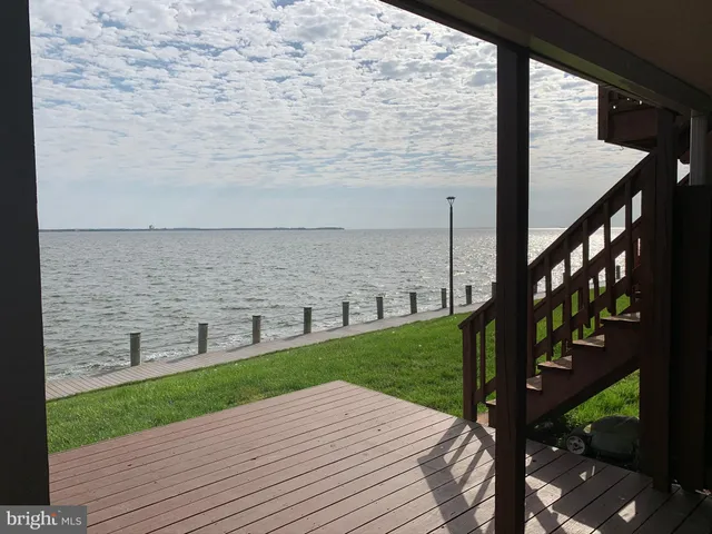 a view of a balcony with an ocean from