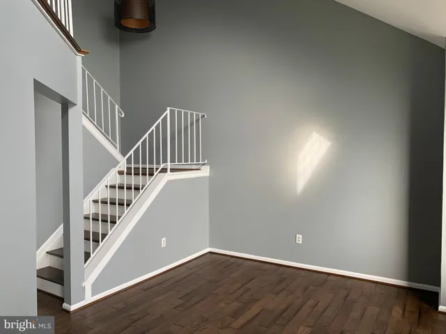a view of entryway with wooden floor