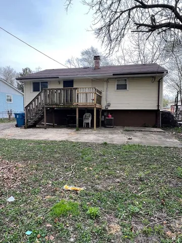 a view of house with outdoor space