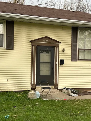 a front view of a house with garage