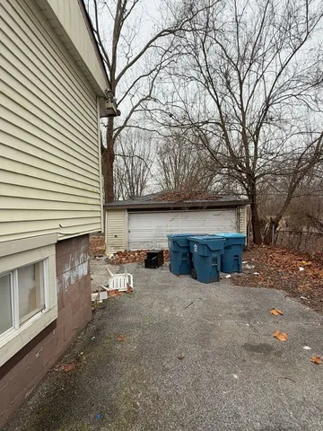 a view of a patio with a yard