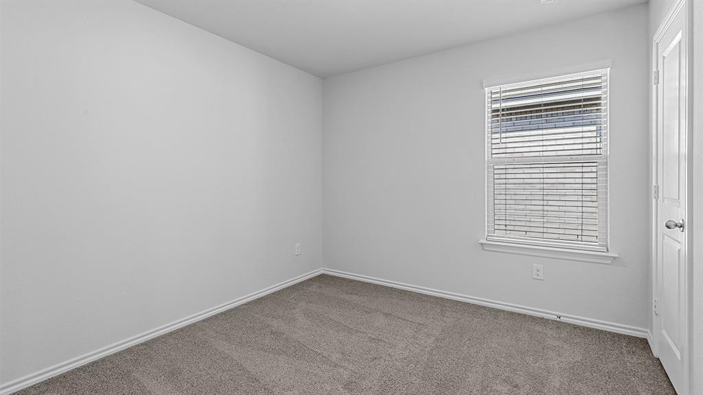 180 Mojave Road Boyd, TX 76023 - Photo 23 of 38 an empty room with a window