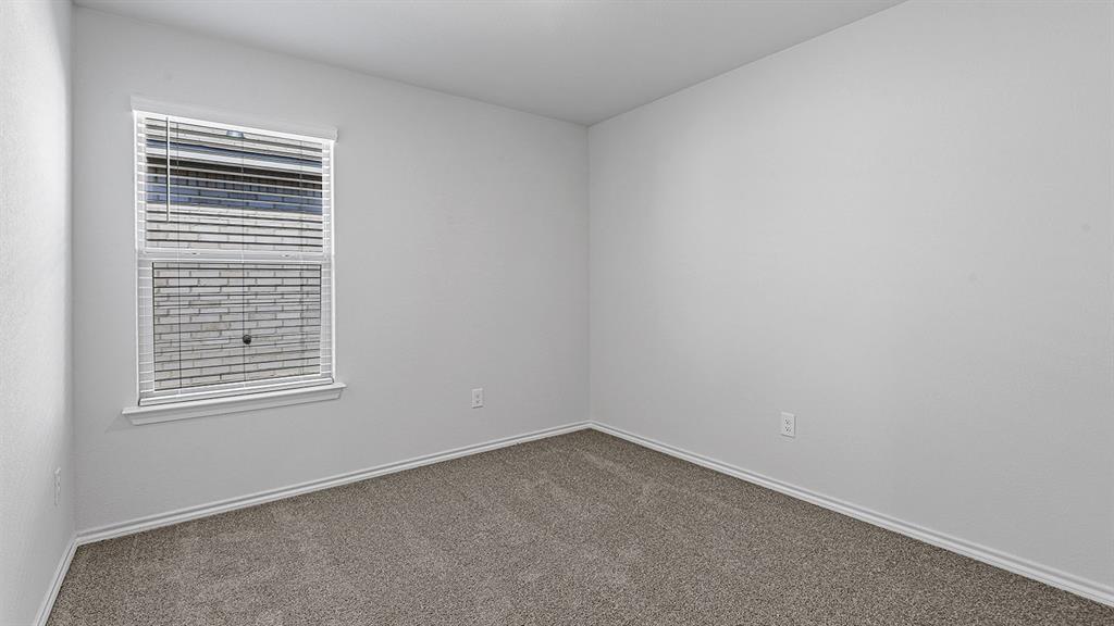 180 Mojave Road Boyd, TX 76023 - Photo 27 of 38 an empty room with a window