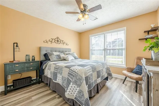 a view of a dining room with furniture and a table chair