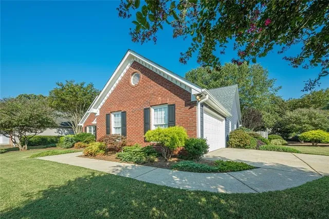 a backyard of a house with lots of green space