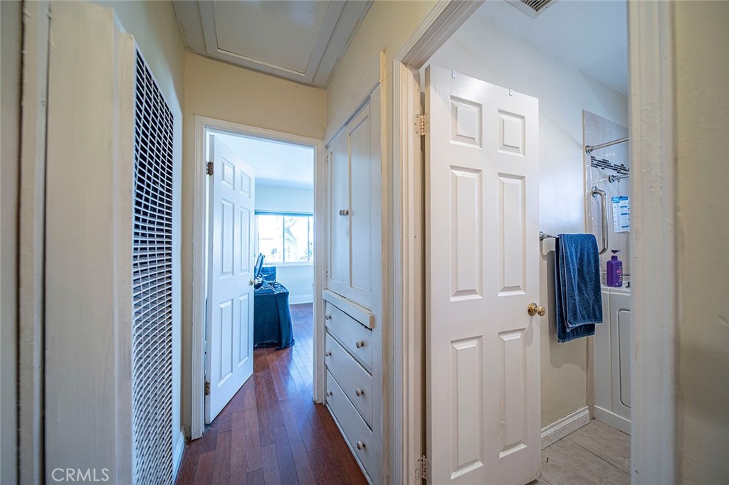 1016 Vina Avenue Long Beach, CA 90813 - Photo 13 of 22 a view of a hallway with wooden floor and closet area
