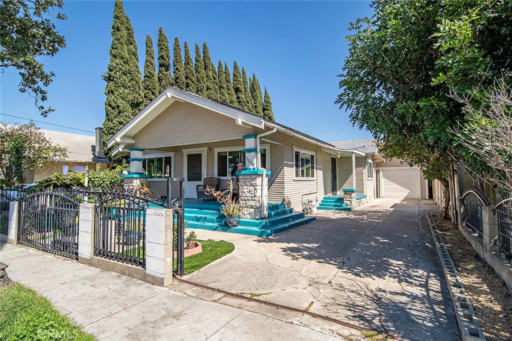 1016 Vina Avenue Long Beach, CA 90813 - Photo 2 of 22 a view of a house with a yard and sitting area