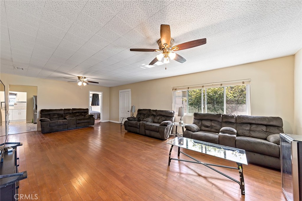 1016 Vina Avenue Long Beach, CA 90813 - Photo 7 of 22 a living room with furniture and a large window
