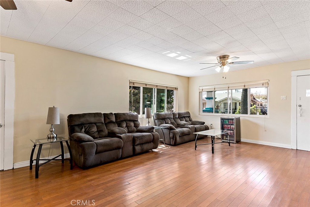 1016 Vina Avenue Long Beach, CA 90813 - Photo 8 of 22 a living room with furniture and a large window
