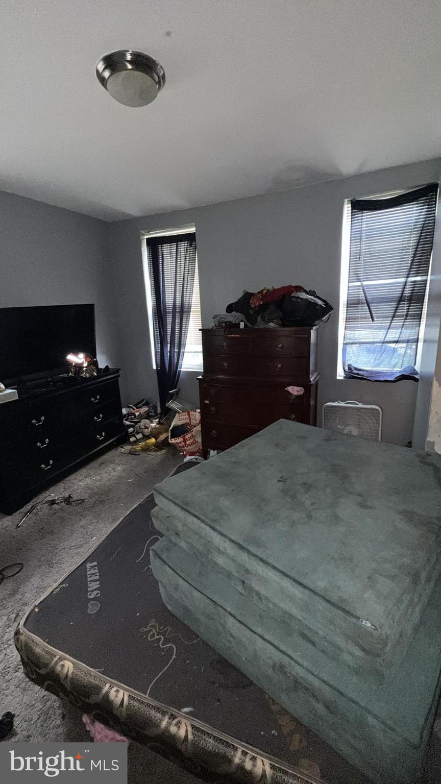 1723 Homestead Street Baltimore, MD 21218 - Photo 26 of 27 a room with a bed and gym equipment