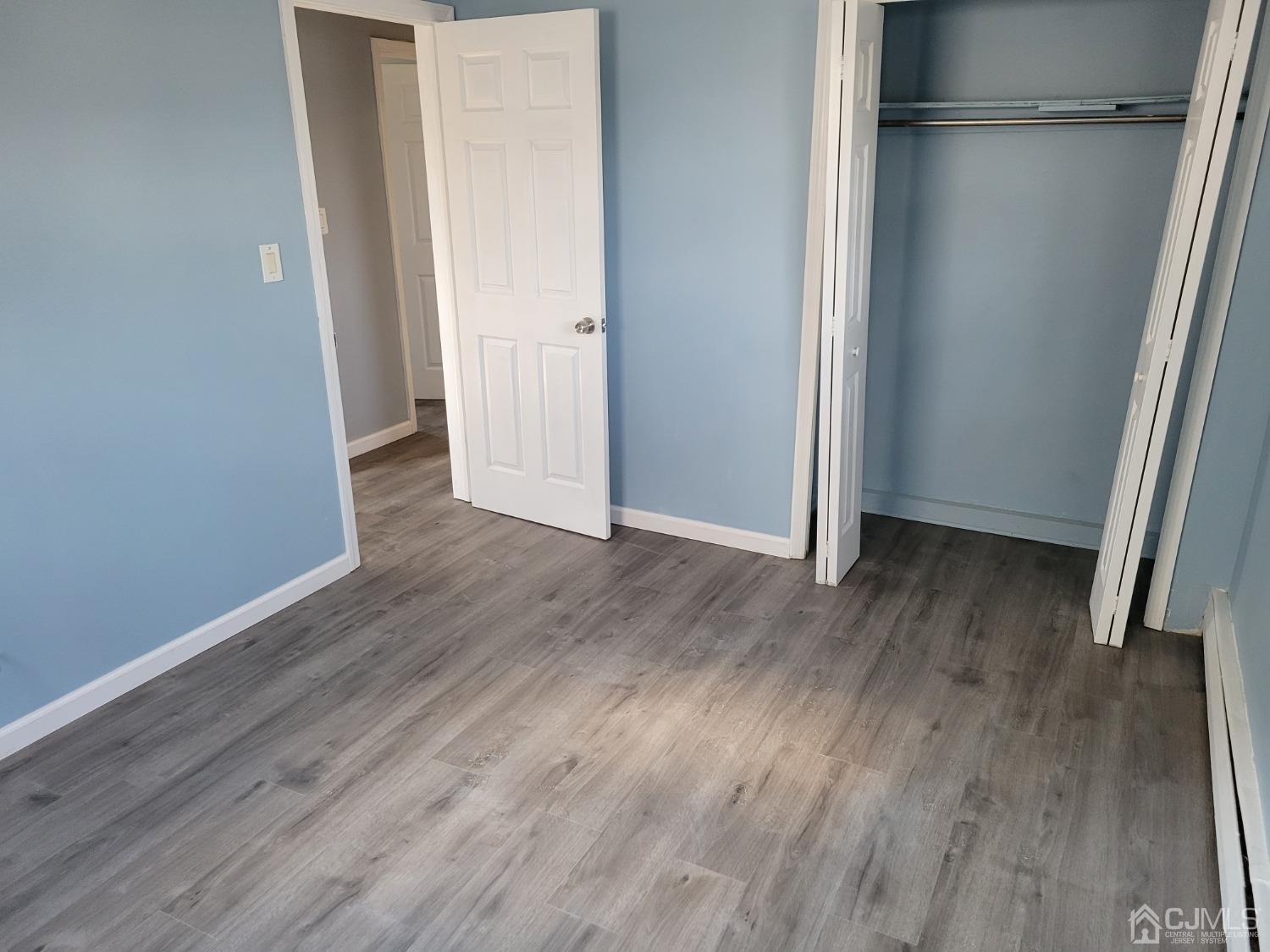 19 Baldwin Road Edison, NJ 08817 - Photo 29 of 36 a view of hallway with wooden floor