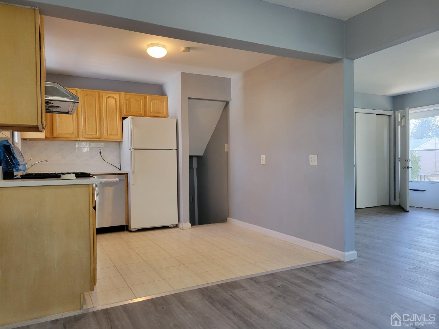19 Baldwin Road Edison, NJ 08817 - Photo 34 of 36 a view of a kitchen with a sink and a refrigerator