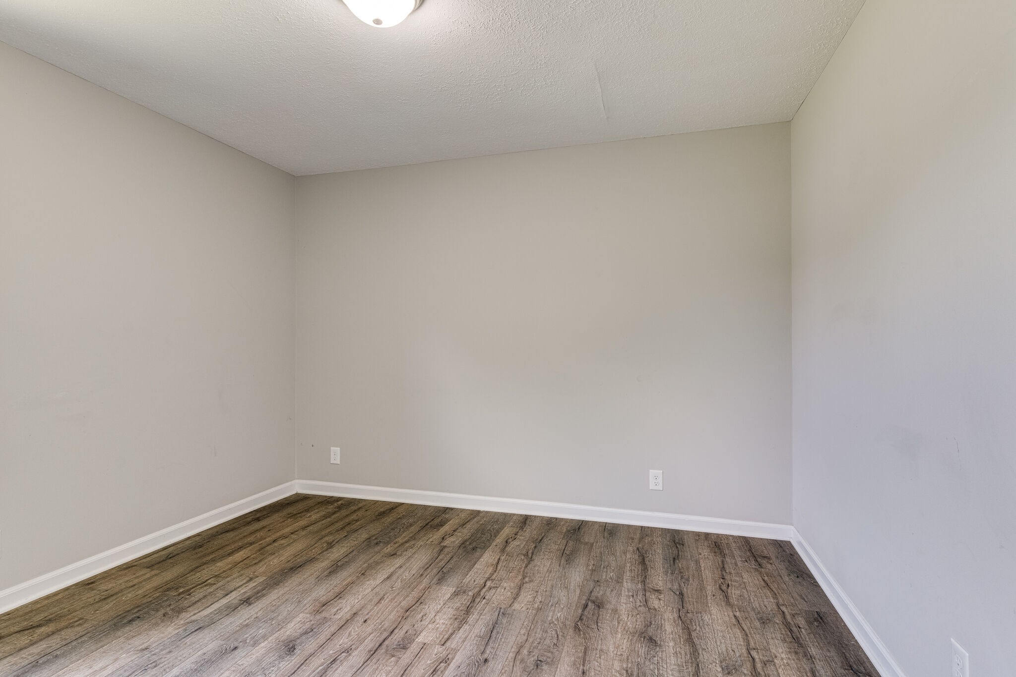 4752 Lahr Road Springfield, TN 37172 - Photo 16 of 27 a view of an empty room and wooden floor