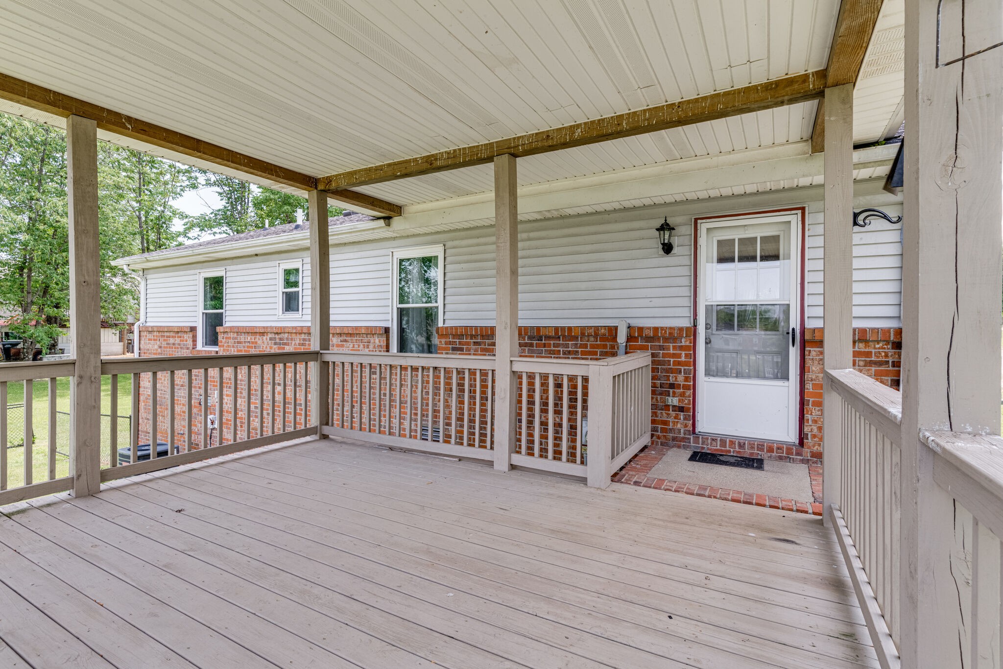 4752 Lahr Road Springfield, TN 37172 - Photo 22 of 27 an empty room with wooden floor and windows