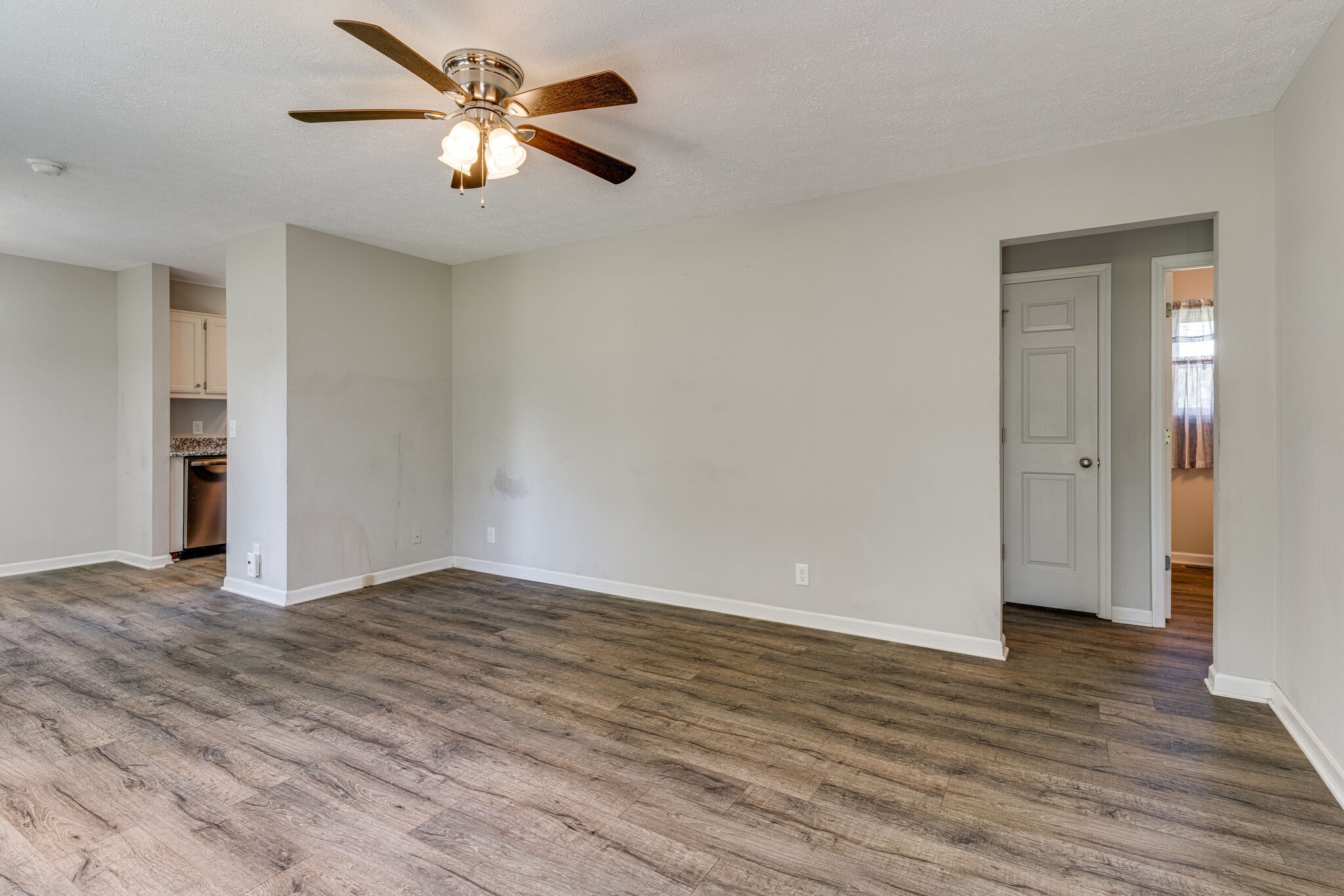 4752 Lahr Road Springfield, TN 37172 - Photo 5 of 27 a view of an empty room and wooden floor