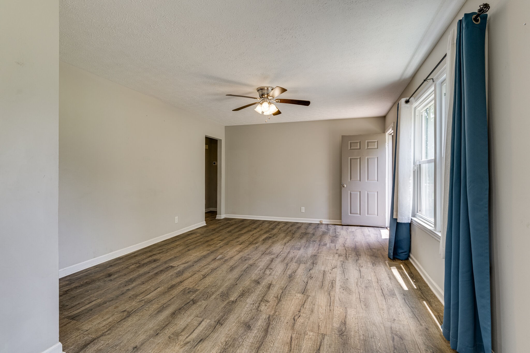 4752 Lahr Road Springfield, TN 37172 - Photo 6 of 27 wooden floor in an empty room with a window