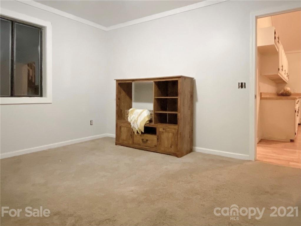 814 Calhoun Trail Rutherfordton, NC 28139 - Photo 14 of 14 a view of an empty room with wooden floor and closet