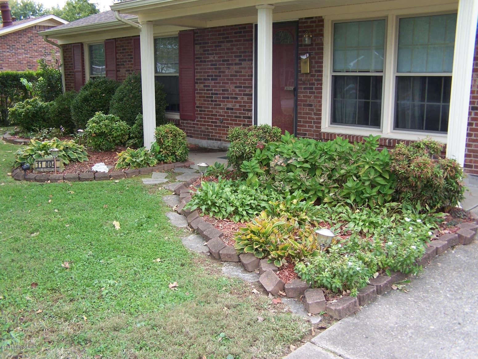 11004 Torrington Road Louisville, KY 40272 - Photo 6 of 43 Professional Landscaping around most of this home...