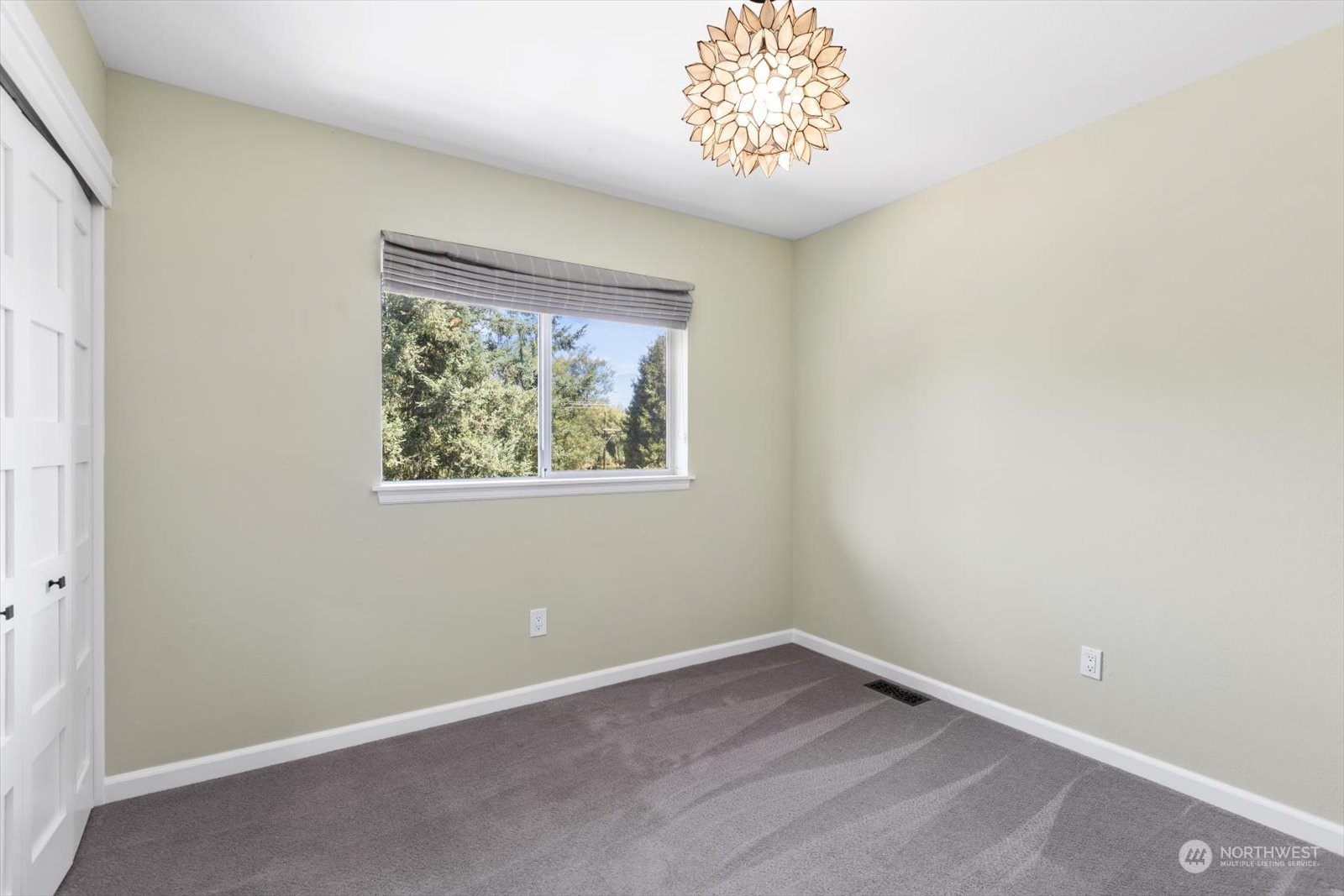 815 213th Street Southeast Bothell, WA 98021 - Photo 25 of 37 an empty room with a window