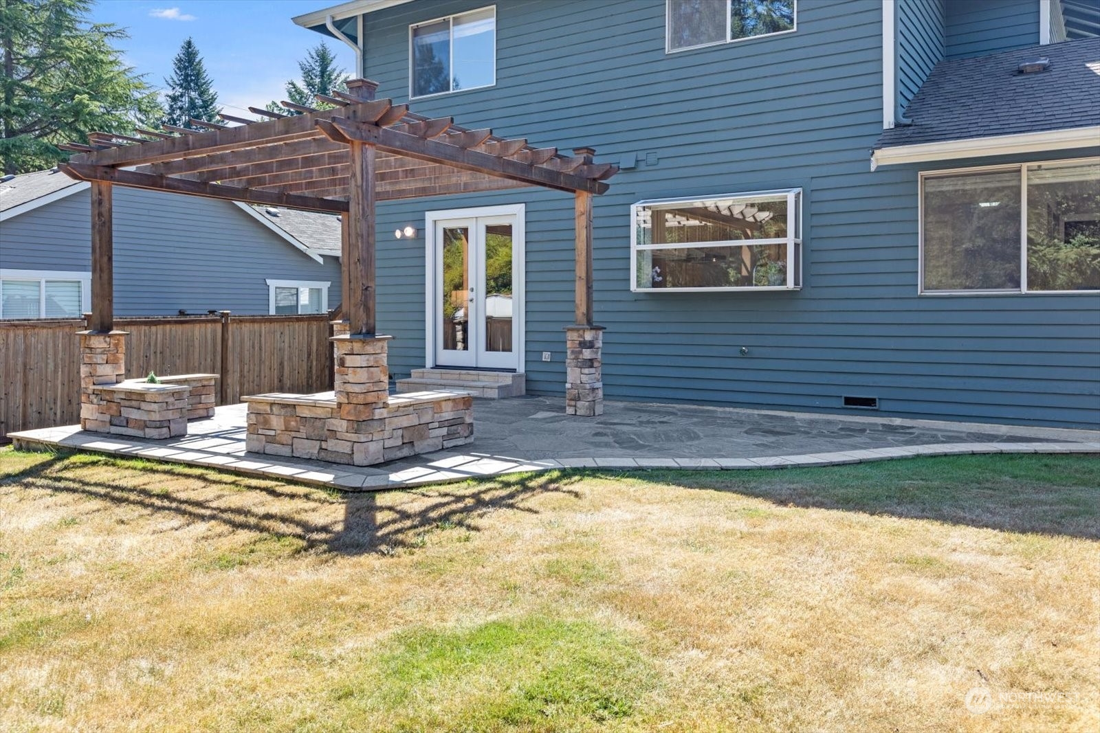 815 213th Street Southeast Bothell, WA 98021 - Photo 31 of 37 a view of a house with swimming pool in front of it