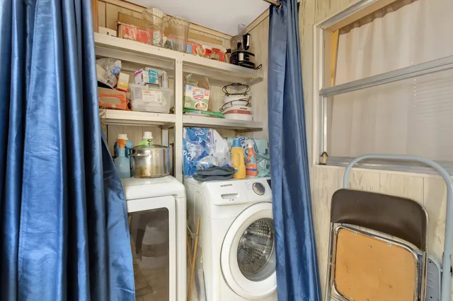 a utility room with dryer and washer