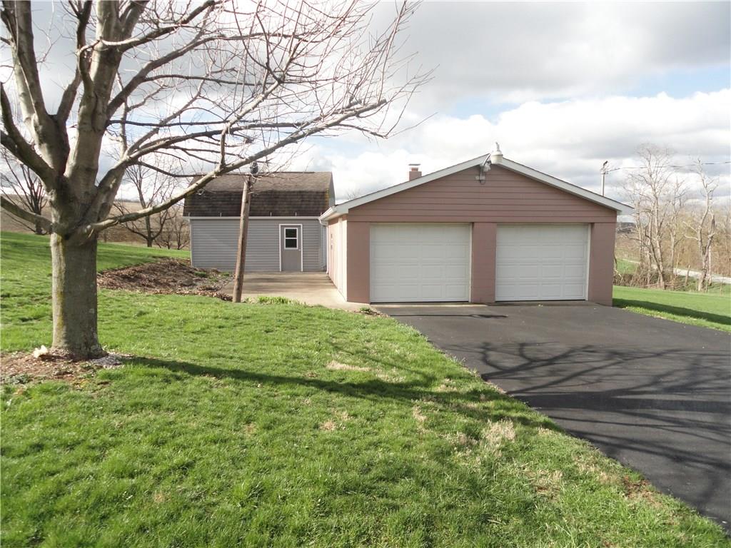 244 Bell Memorial Road Latrobe, PA 15650 - Photo 12 of 16 Oversized detached garage plus storage shed with attic area.