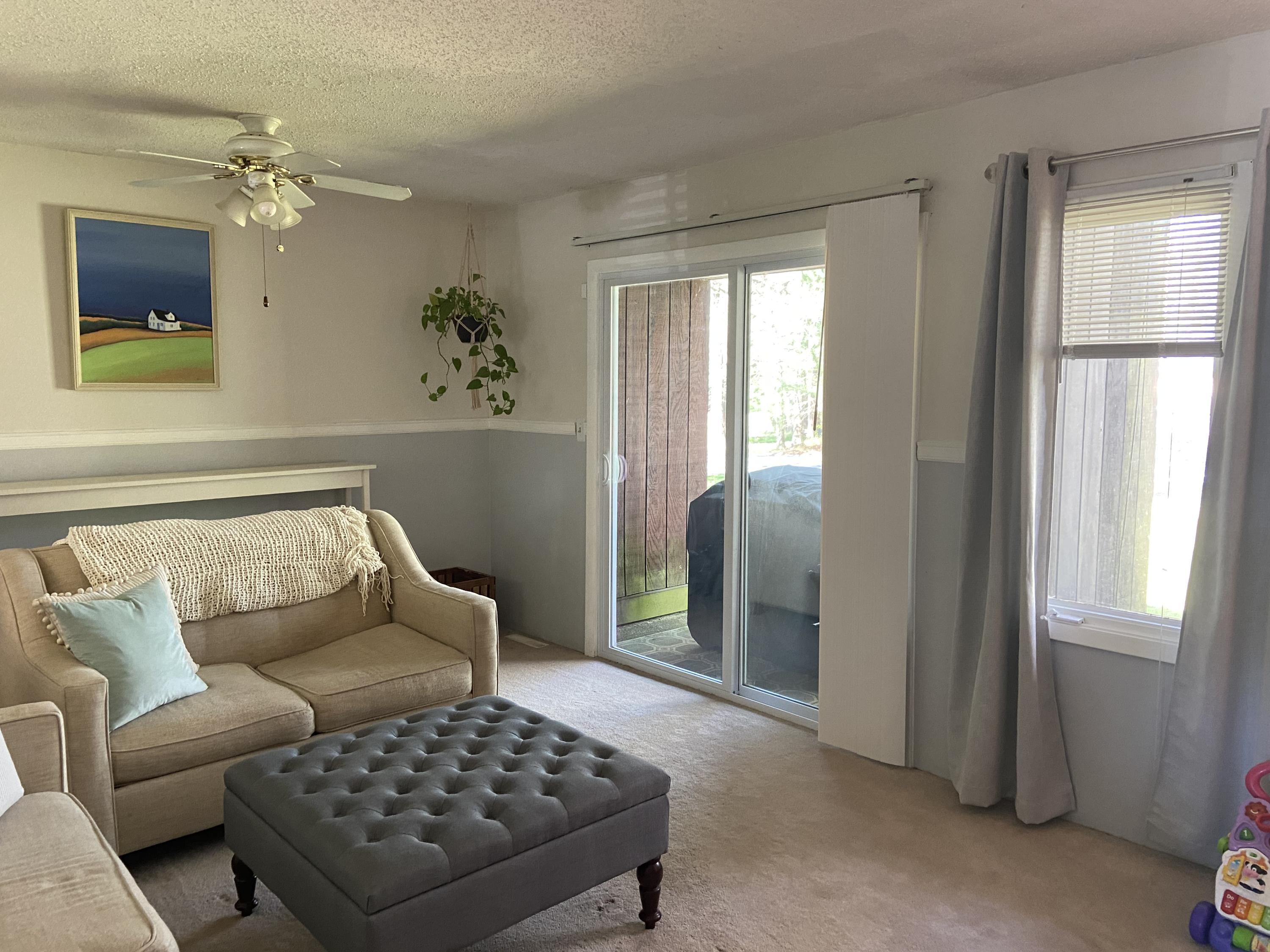 7 Roberta Drive, Unit G Buzzards Bay, MA 02532 - Photo 2 of 13 a living room with furniture and a window