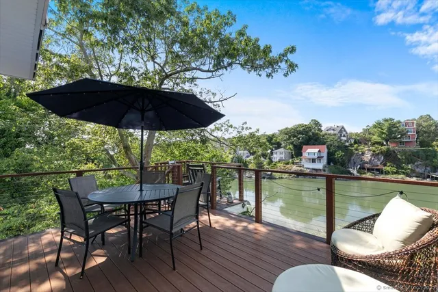 an outdoor space with furniture and umbrella