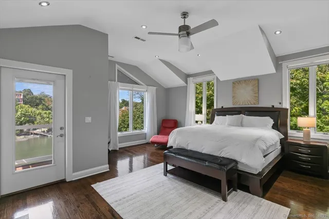 a bed room with a bed and a window