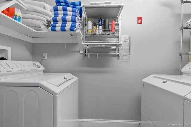 a utility room with dryer and washer