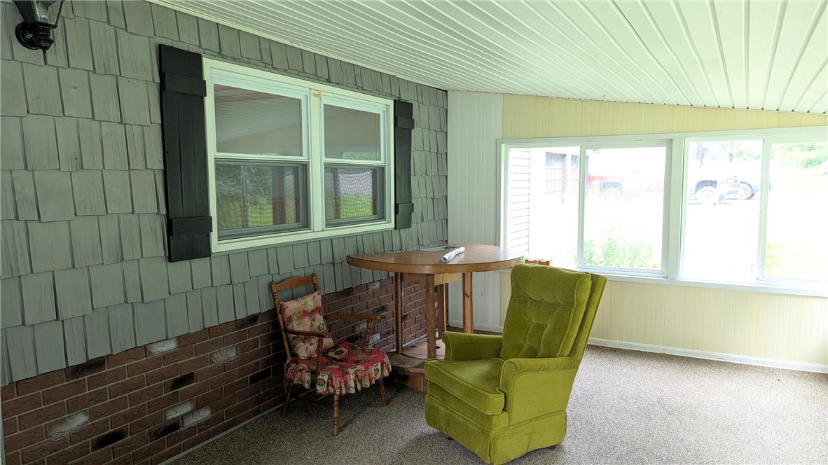 683 Lower 3rd Brook Road Walton, NY 13856 - Photo 7 of 27 Florida room gives wonderful access to main floor of home.