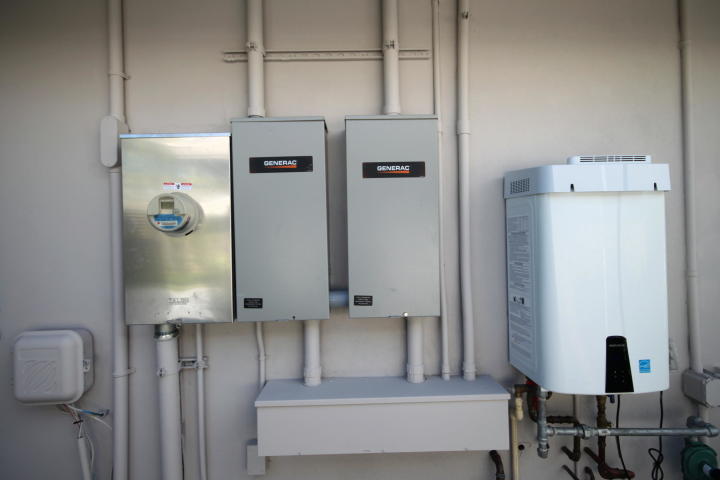 7451 Northeast Bay Isle Court Boca Raton, FL 33487 - Photo 39 of 41 Generator Power Mgn't & 2 Tankless Ho