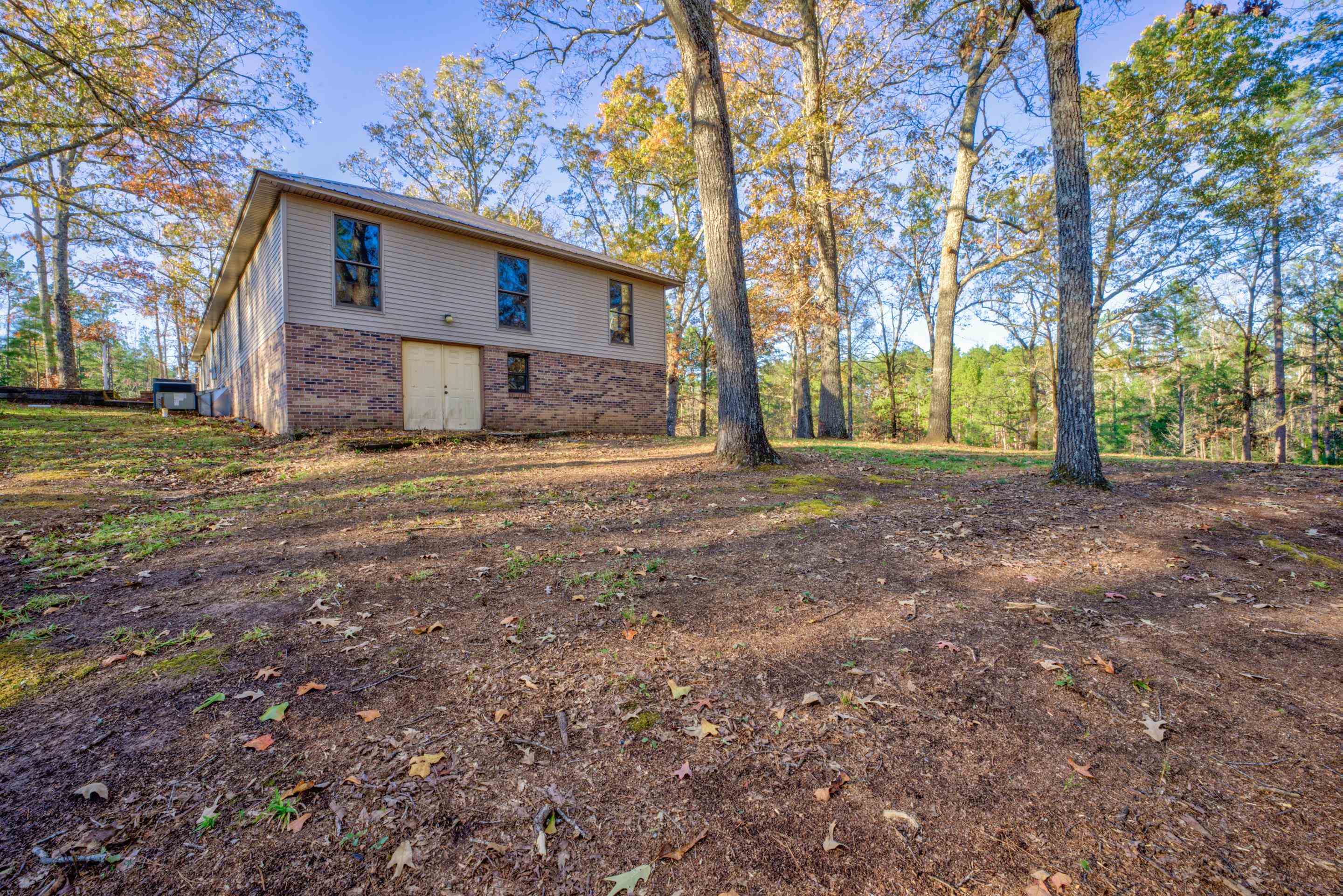 183 Matlock Road Ramer, TN 38367 - Photo 21 of 34 a view of a house with a yard