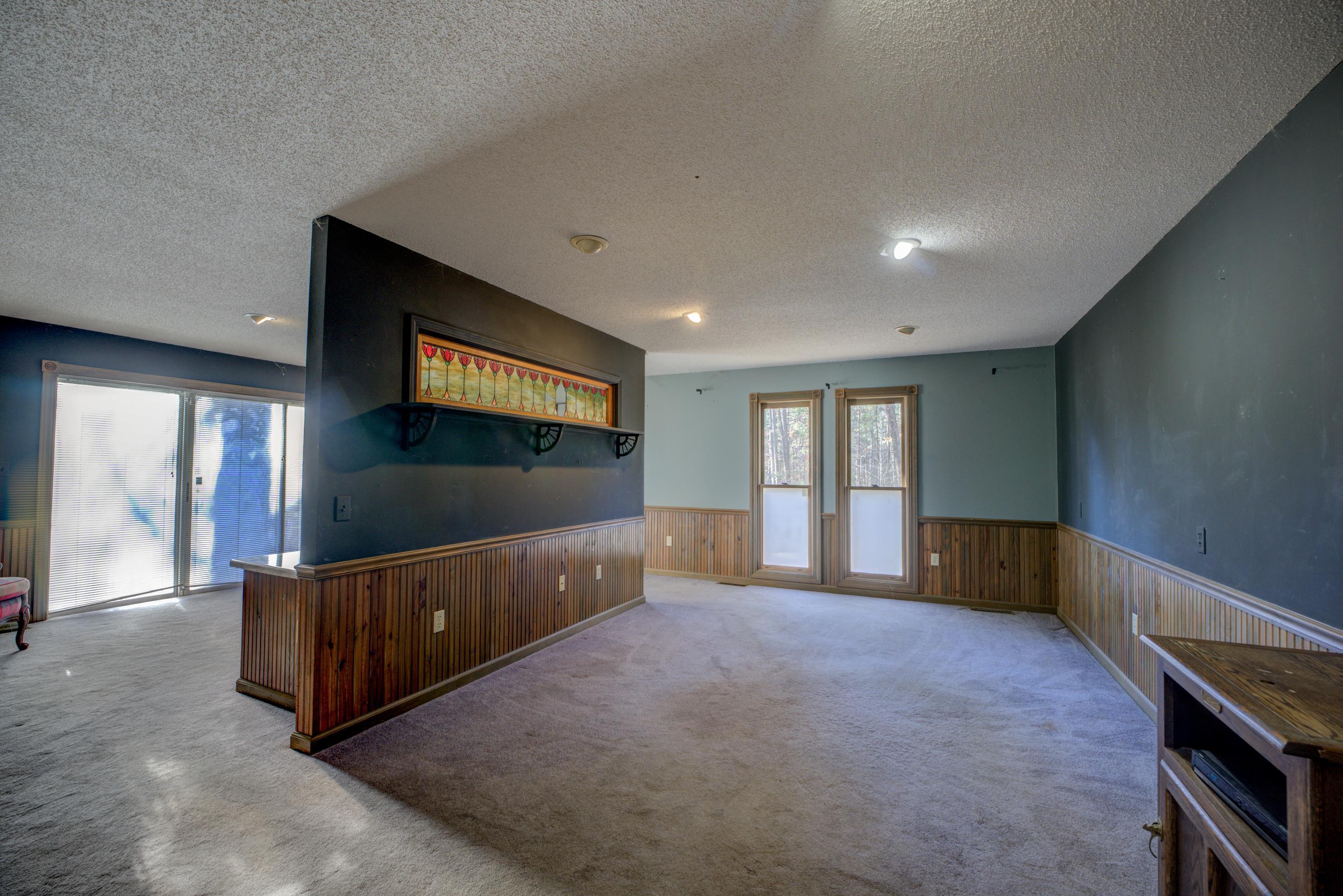183 Matlock Road Ramer, TN 38367 - Photo 22 of 34 a living room with furniture and a flat screen tv