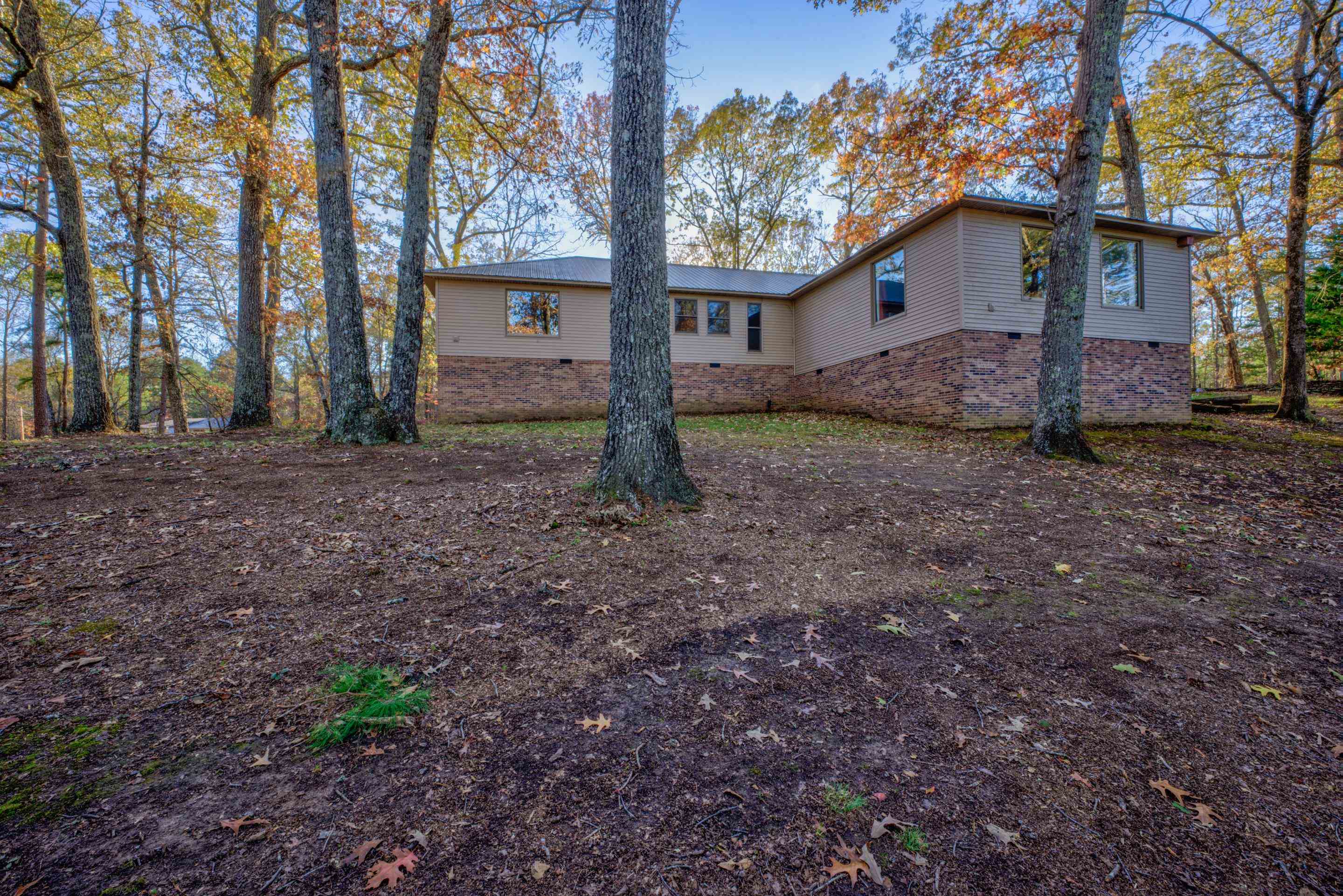 183 Matlock Road Ramer, TN 38367 - Photo 31 of 34 a backyard of a house with lots of green space