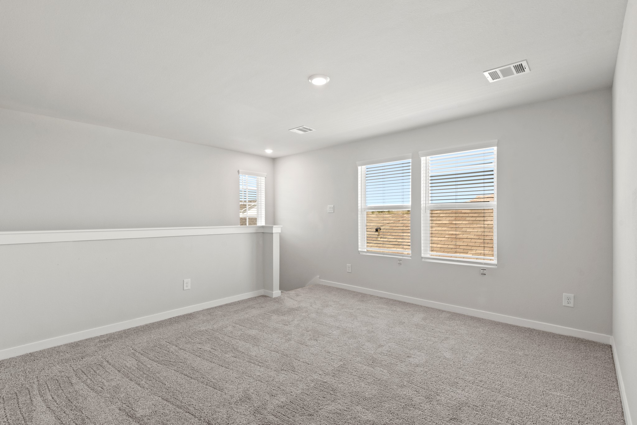 17211 King Eider Road Waller, TX 77484 - Photo 12 of 30 a view of an empty room with a window