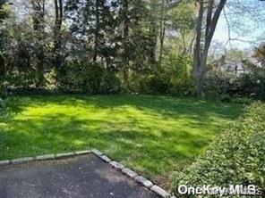 41 Woodbine Road East Hills, NY 11577 - Photo 5 of 15 a view of an outdoor space and yard