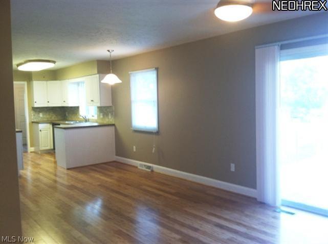 8425 Congress Road Lodi, OH 44254 - Photo 3 of 14 Glowing bamboo flooring.