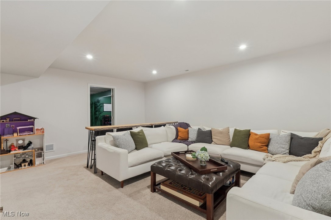 228 Stone Ridge Way Berea, OH 44017 - Photo 29 of 44 Living room featuring carpet and recessed lighting