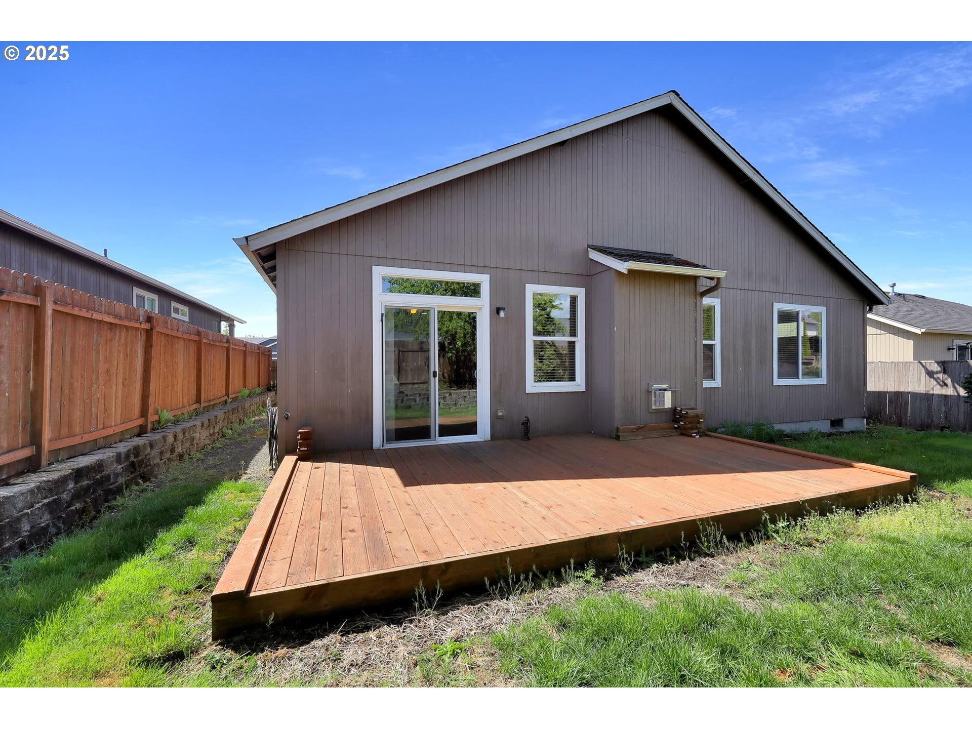 5770 Mineral Way Springfield, OR 97478 - Photo 16 of 18 a view of an house with backyard porch and sitting area